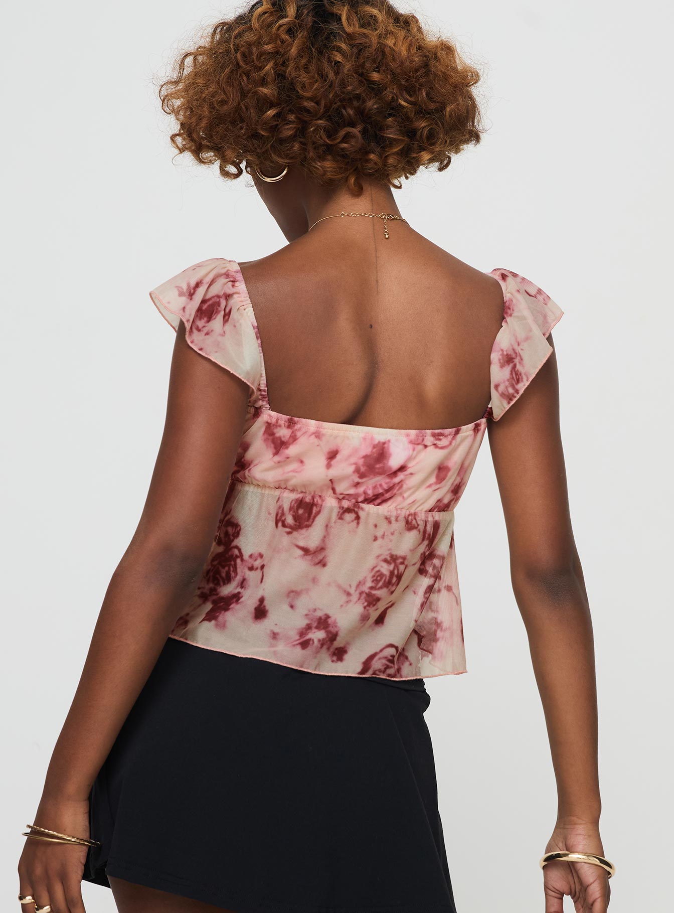 back view of model wearing Princess Polly Time After Top Pink Floral Short Sleeves V-Neck 