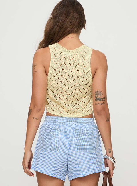 back view of model wearing Princess Polly Walnut Top Cream Sleeveless Scoop Neck 