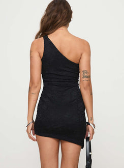 back view of model wearing Princess Polly Toomba Lace Mini Dress Black Asymmetric Neckline 