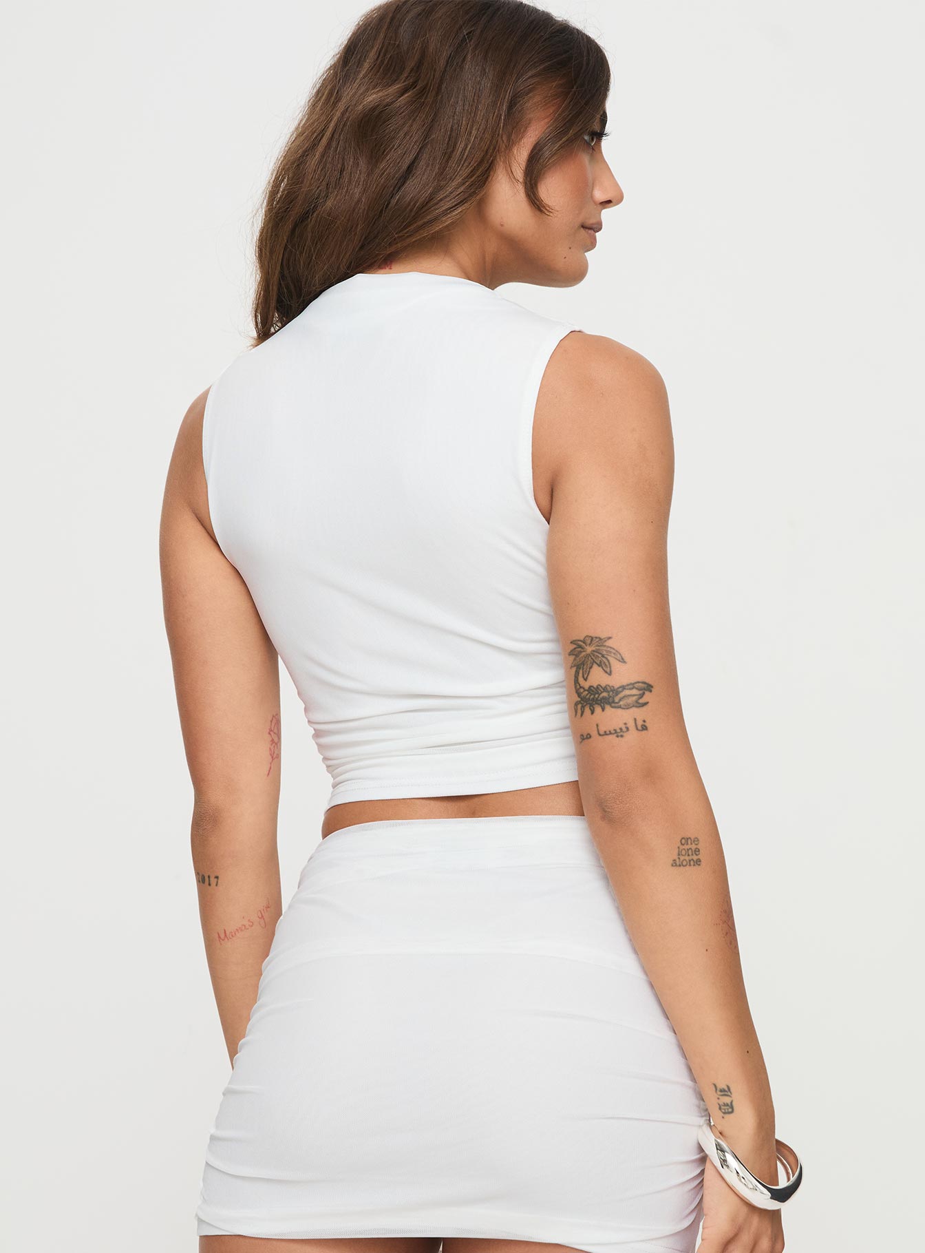 back view of model wearing Princess Polly Lychee Top Multi Sleeveless High Neck 