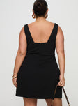 back view of model wearing Princess Polly Bombshell Mini Dress Black Curve Square Neck 