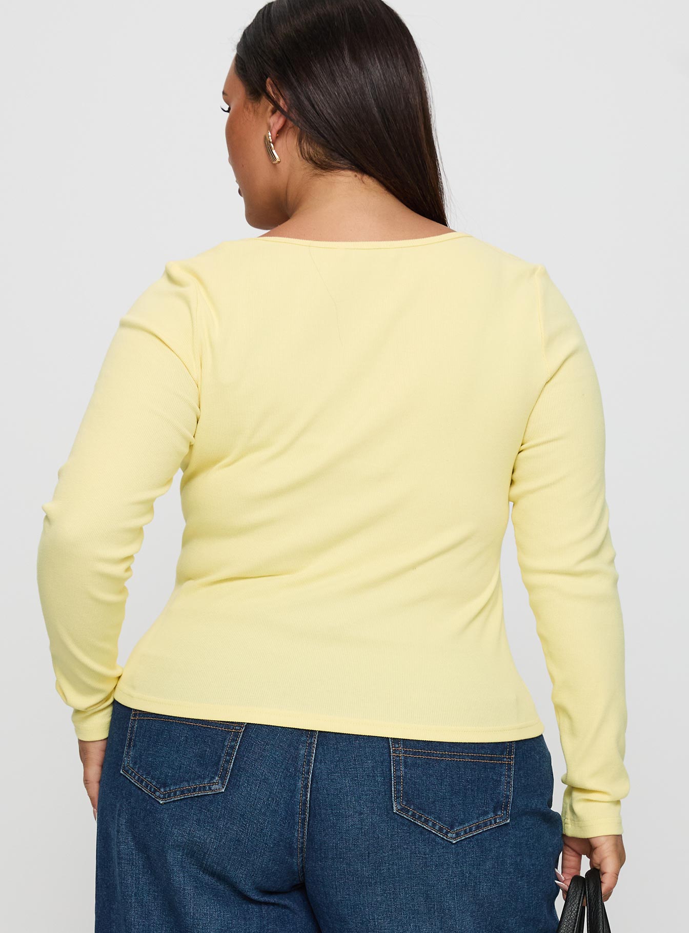 back view of model wearing Princess Polly Baseline Long Sleeve Top Yellow Curve Full Sleeves Scoop Neck 