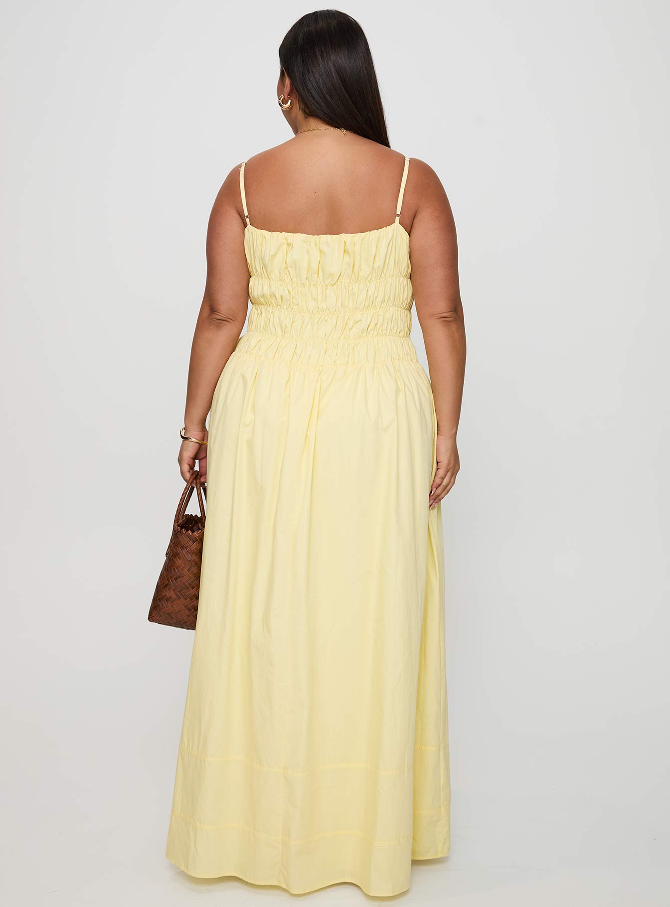 back view of model wearing Princess Polly Loralei Shirred Maxi Dress Yellow Curve Square Neck 