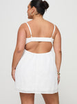 back view of model wearing Princess Polly Granno Mini Dress White Curve Plunger 