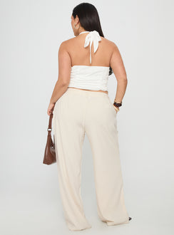 back view of model wearing Princess Polly Irresistible Wide Leg Pant Cream Curve High Waisted Pants 