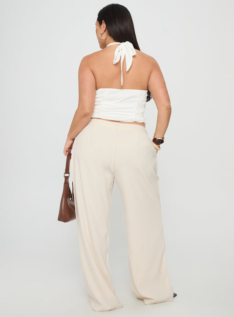 back view of model wearing Princess Polly Irresistible Wide Leg Pant Cream Curve High Waisted Pants 