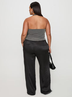back view of model wearing Princess Polly First Place Low Rise Satin Pant Black Curve Low Rise Pants 