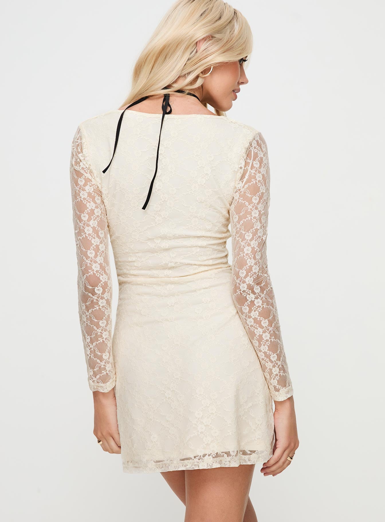 back view of model wearing Princess Polly Kael Long Sleeve Mini Dress Cream Scoop Neck 