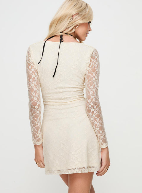 back view of model wearing Princess Polly Kael Long Sleeve Mini Dress Cream Scoop Neck 