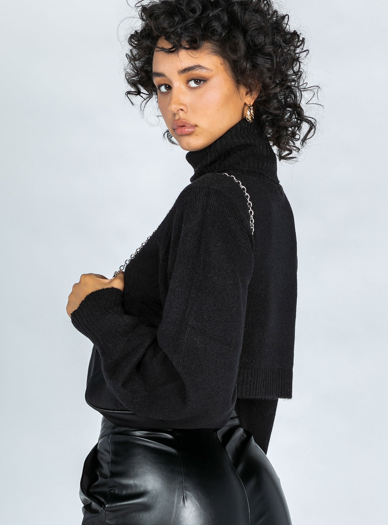 back view of model wearing Princess Polly Zahara Cropped Turtleneck Sweater Black Petite Cropped 