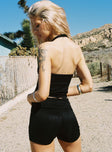 back view of model wearing Princess Polly Moderna Halter Lace Top Black Sleeveless Plunger 