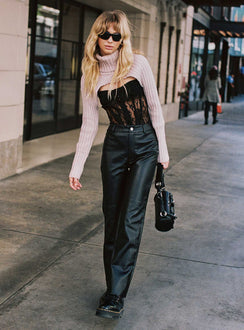 side view of model wearing Princess Polly Macey Pants Black Petite High Waisted Pants 