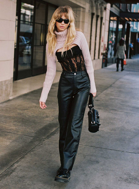 side view of model wearing Princess Polly Macey Pants Black Petite High Waisted Pants 