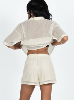 Matching set Sheer material Button up shirt Classic collar Button fastening at front Drop shoulder  Twin chest pockets Shorts High rise Elasticated waistband