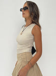 Front view of model wearing  front Princess Polly Sleeveless Sweetheart  Escoda Top Beige