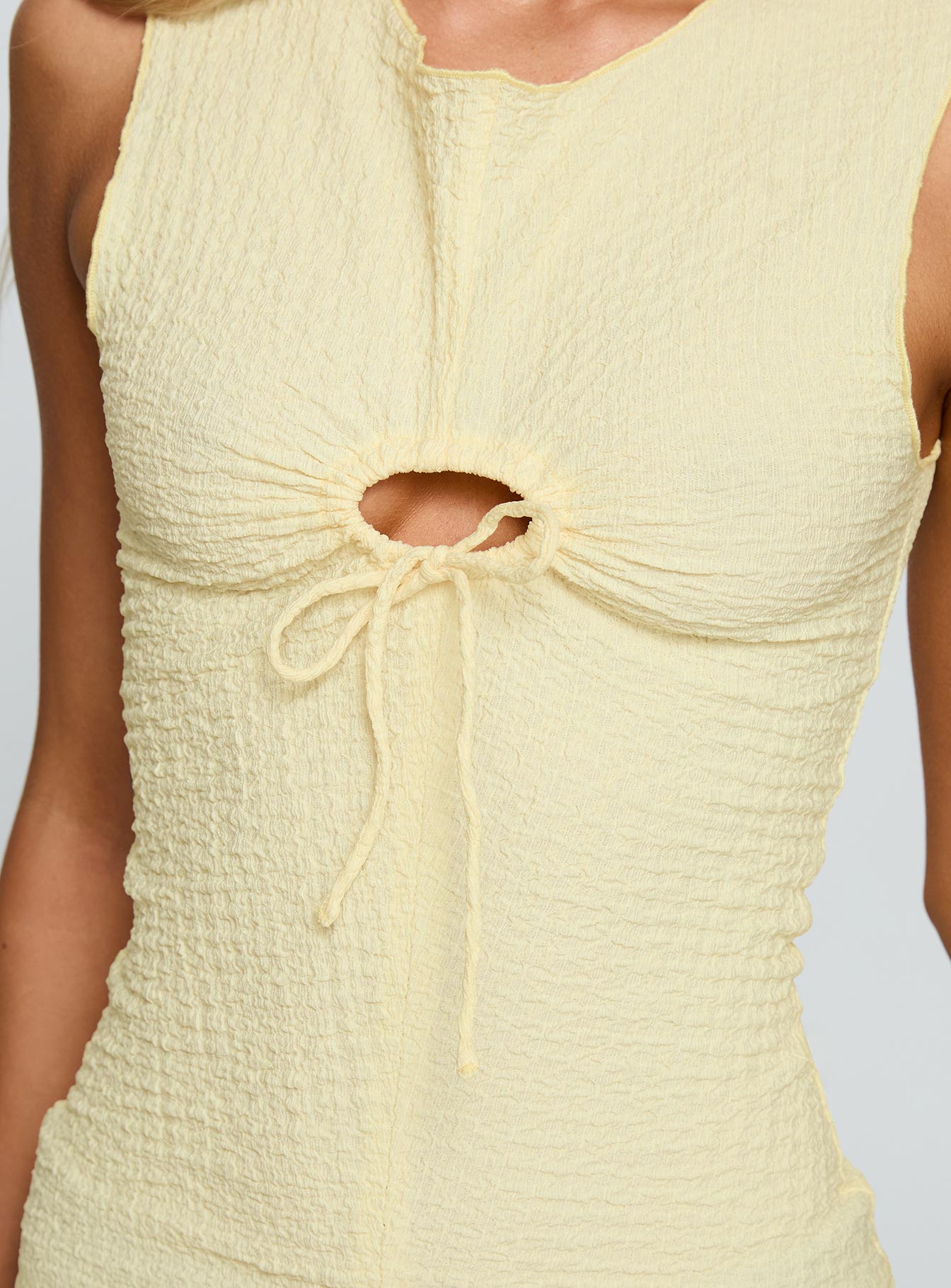 back view of model wearing Princess Polly Souls Intertwine Cut Out Top Yellow Sleeveless Crew Neck 