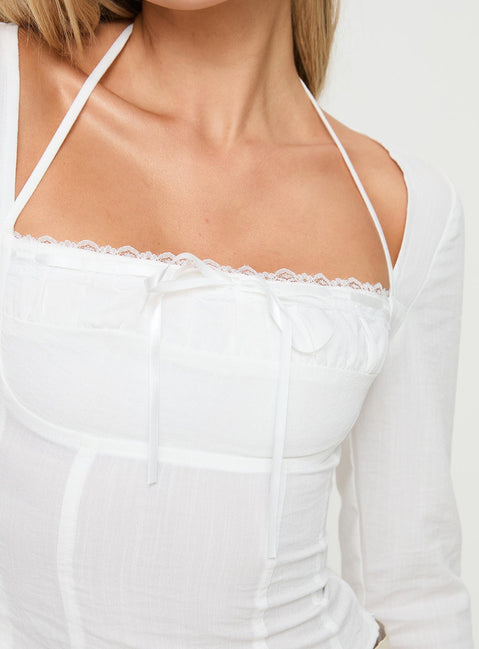 back view of model wearing Princess Polly Talgada Long Sleeve Top White Full Sleeves Square Neck 