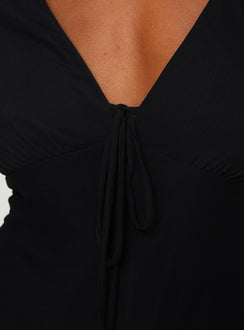 Romper Long sheer mesh sleeves, V-neckline, tie detail at bust, ruching detail at bust Invisible zip fastening at back 