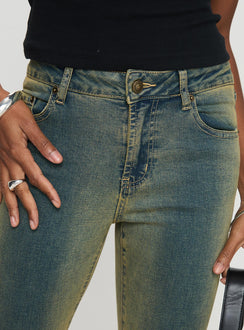 front view of model wearing Princess Polly Sandman Flare Jeans Antique Wash Mid Rise 