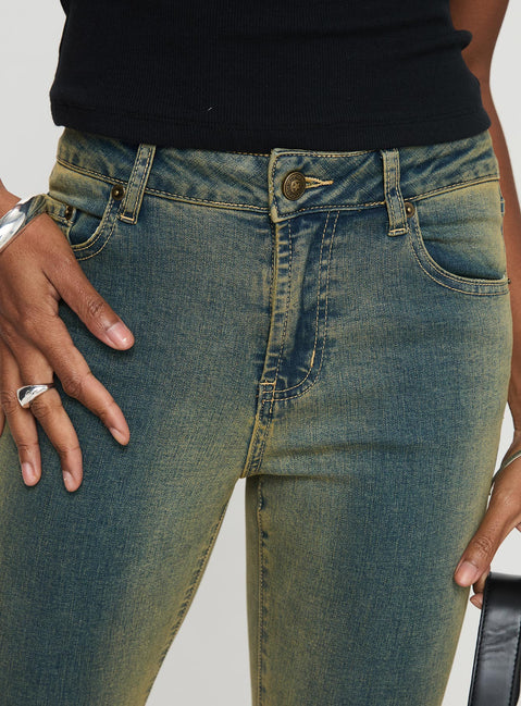 front view of model wearing Princess Polly Sandman Flare Jeans Antique Wash Mid Rise 