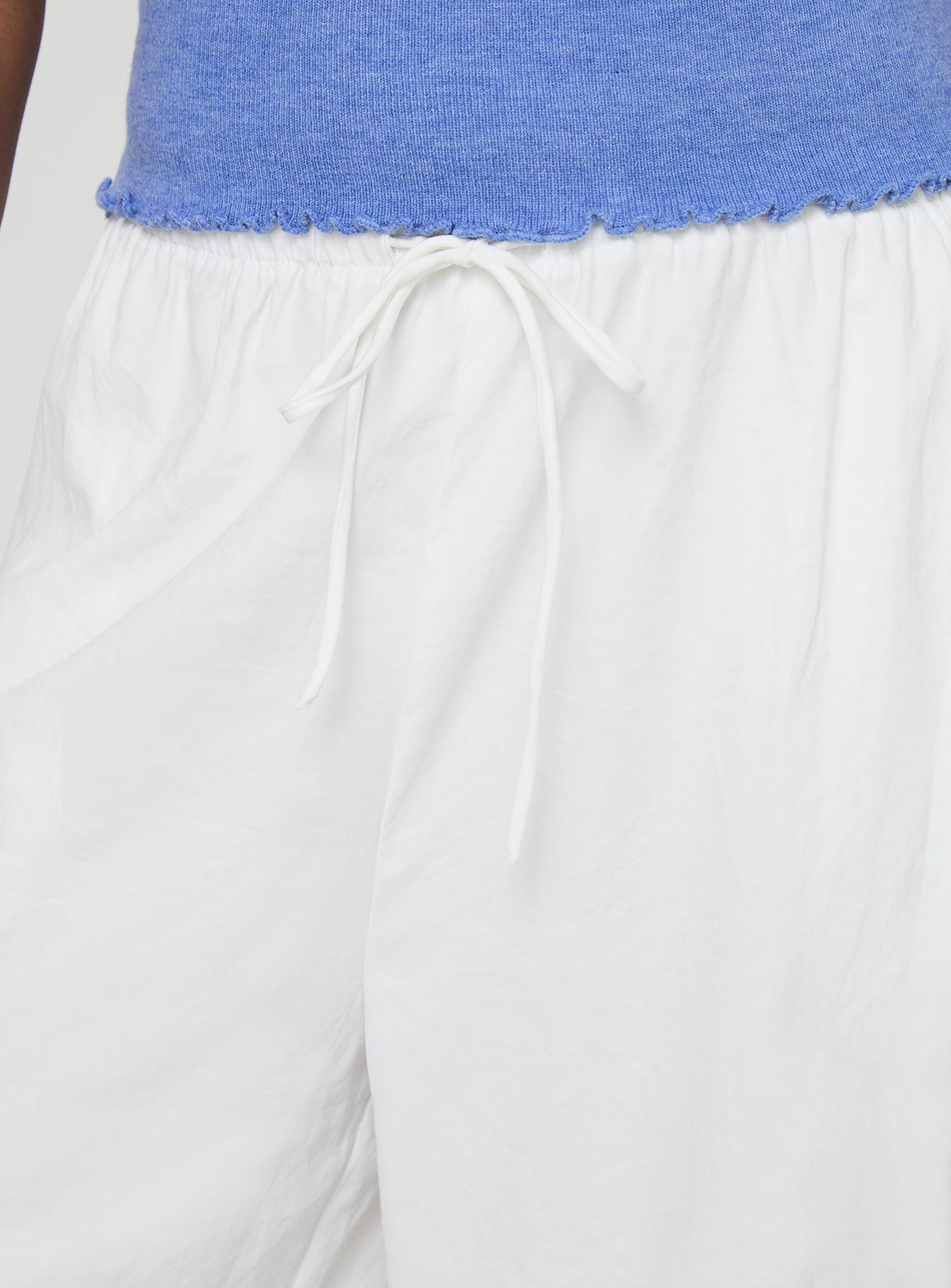 side view of model wearing Princess Polly Barbieri Pants White High Waisted Pants 