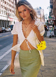 White top tie front fastening lace up fastening at back, puff sleeves, slightly sheer
