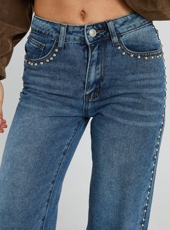 back view of model wearing Princess Polly Saving Up Stud Detail Jeans Mid Blue Mid Rise 