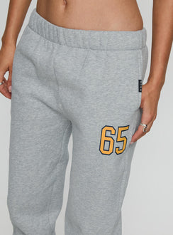 side view of model wearing Princess Polly UC Irvine Basic Sweatpants Grey Mid Rise Pants 