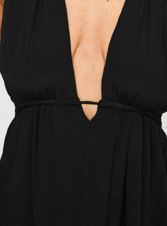 side view of model wearing Princess Polly Saddler Mini Dress Black Plunger 