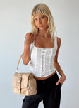 White corset top Sheer lace material Square neckline Hook and eye fastening at front Good stretch Mesh lining