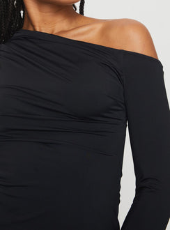 side view of model wearing Princess Polly Lasharie Long Sleeve Top Black Full Sleeves Asymmetric Neckline 