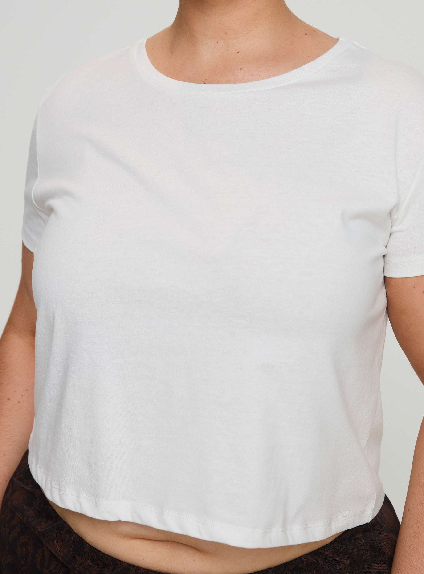 back view of model wearing Princess Polly Micah Tee White Curve Short Sleeves Crew Neck 