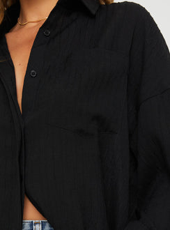 back view of model wearing Princess Polly Kamen Shirt Black Full Sleeves V-Neck 