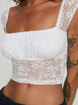 Lace top Fixed shoulder straps, scooped neckline, ruched bust Good stretch, lined bust