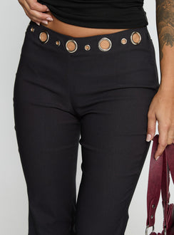 back view of model wearing Princess Polly True Grit Eyelet Flare Pants Grey Mid Rise Pants 