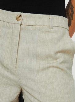 back view of model wearing Princess Polly Stacks Cargo Pant Beige Mid Rise 