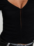 back view of model wearing Princess Polly Tenzin Ruched Top Black Full Sleeves V-Neck 