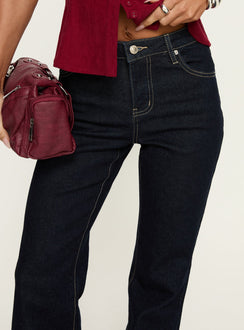 side view of model wearing Princess Polly Magic Mirror Mid Rise Bootleg Jeans Raw Indigo Mid Rise Jeans 