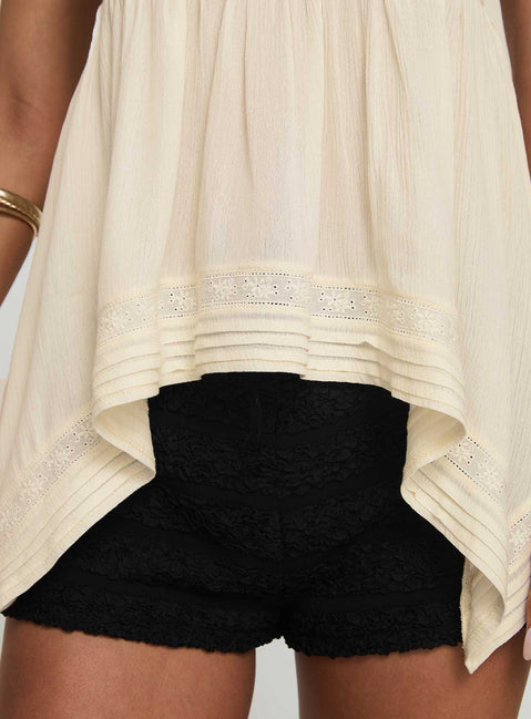 back view of model wearing Princess Polly Miku Top Cream Sleeveless Square Neck 