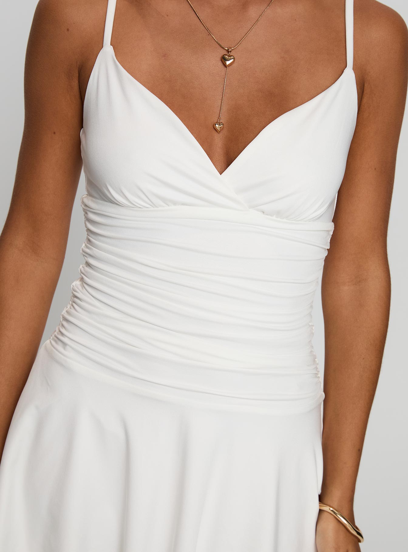 front view of model wearing Princess Polly Andersson Mini Dress White Plunger 