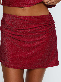 back view of model wearing Princess Polly Tauren Mini Skirt Red Glitter Mini Skirts 