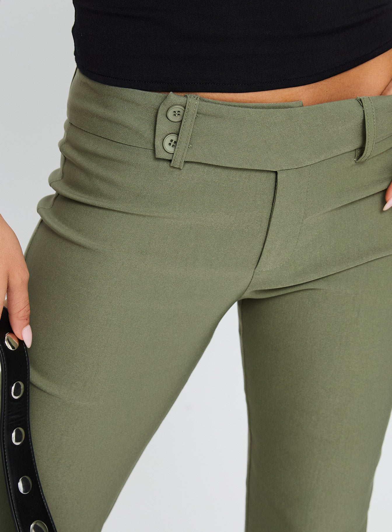 front view of model wearing Princess Polly Kinkirk Flared Pants Olive Green Low Rise Pants 