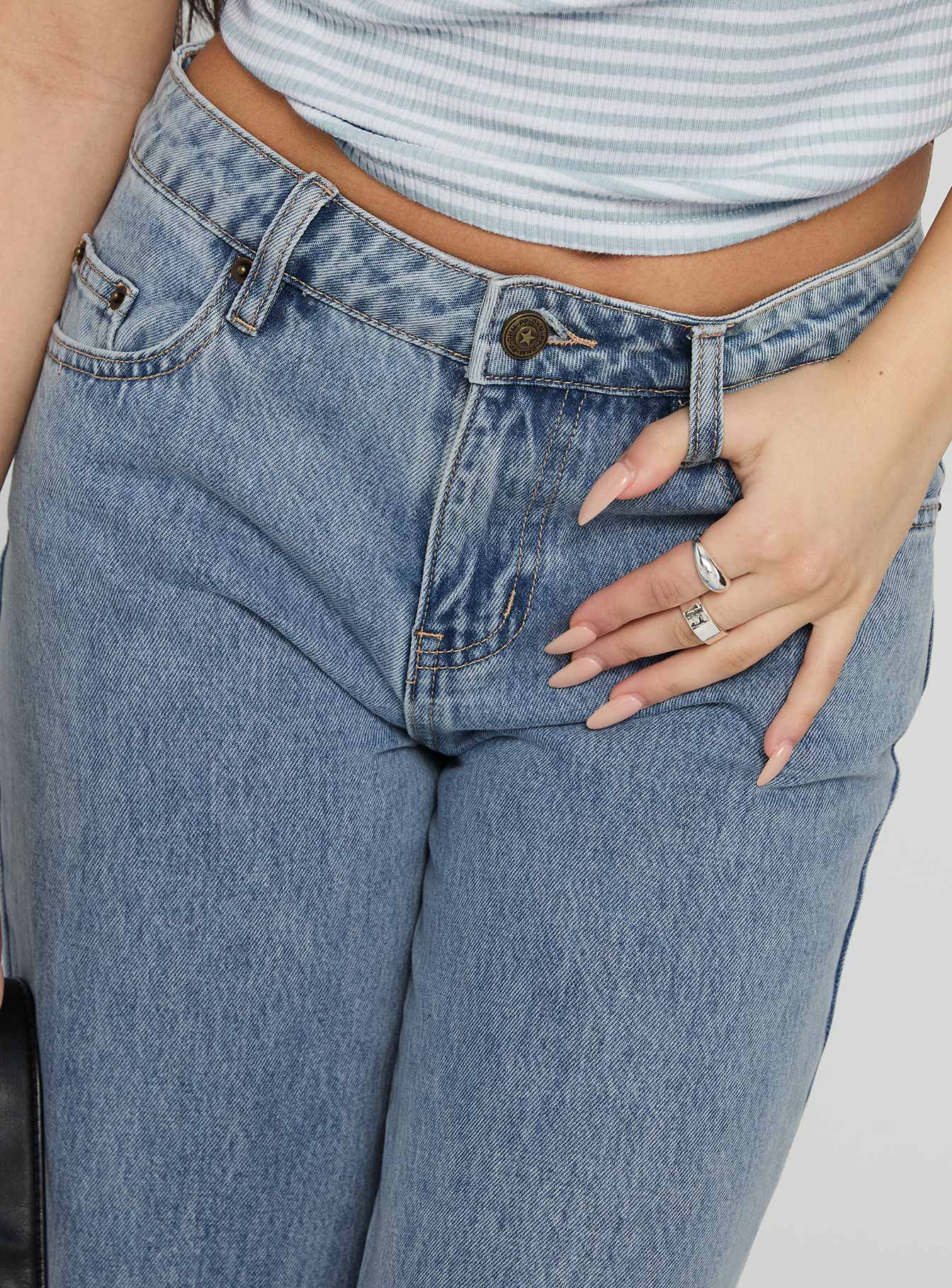 back view of model wearing Princess Polly Kadison Low Rise Straight Leg Jeans Mid Wash Blue Low Rise Jeans 