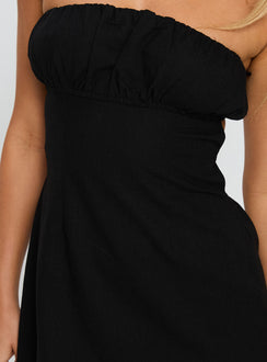 side view of model wearing Princess Polly Luvstruck Strapless Mini Dress Black Straight Neck 