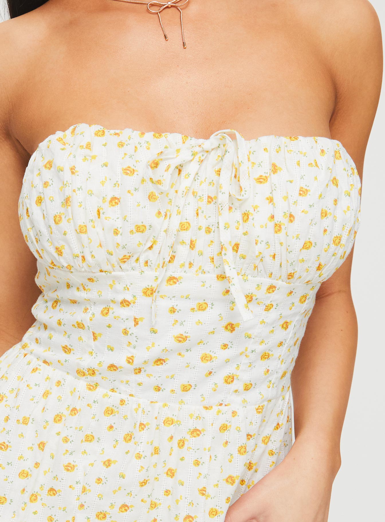 back view of model wearing Princess Polly Calidora Strapless Mini Dress Orange Floral Straight Neck 