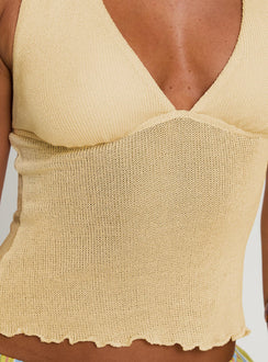 back view of model wearing Princess Polly Leam Top Butter Sleeveless Plunger 