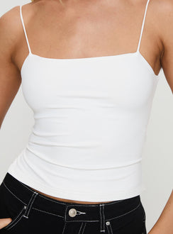 side view of model wearing Princess Polly Elissa Top White Sleeveless Square Neck 