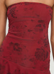 Red <ul> <li>Strapless mini dress</li> <li>Floral print, inner silicone strip at bust, asymmetric frill hem</li> </ul>