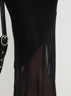   side view of model wearing Princess Polly Dauntless Sheer Maxi Skirt Black Maxi 