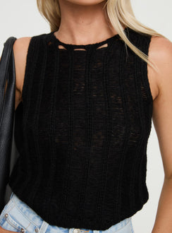 front view of model wearing Princess Polly Jella Knit Top Black Sleeveless Crew Neck 